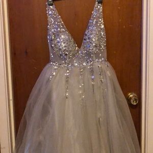 Selling a silver prom dress!